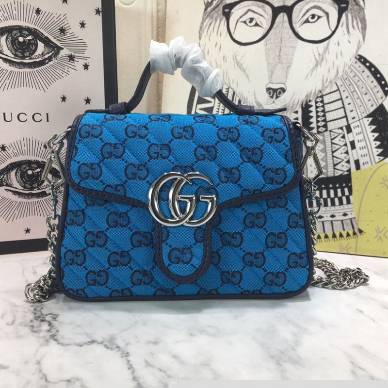 G*u*i top handle bags